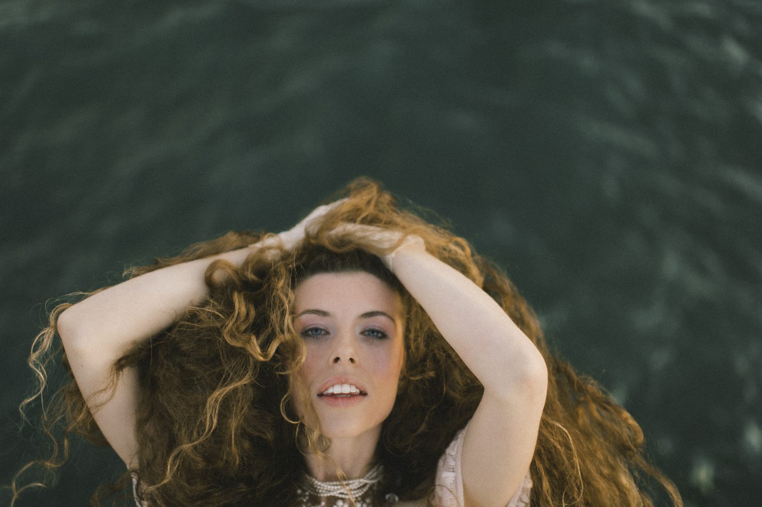 Hannah Wicklund, portrait by the water