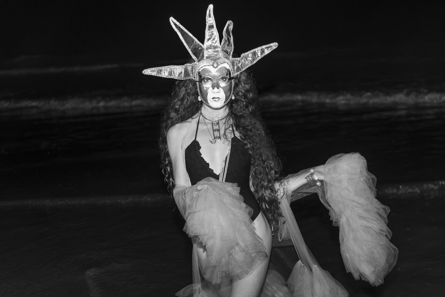 Hannah Wicklund on the beach in a star headdress